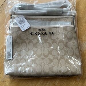 coach crossbody zip line.